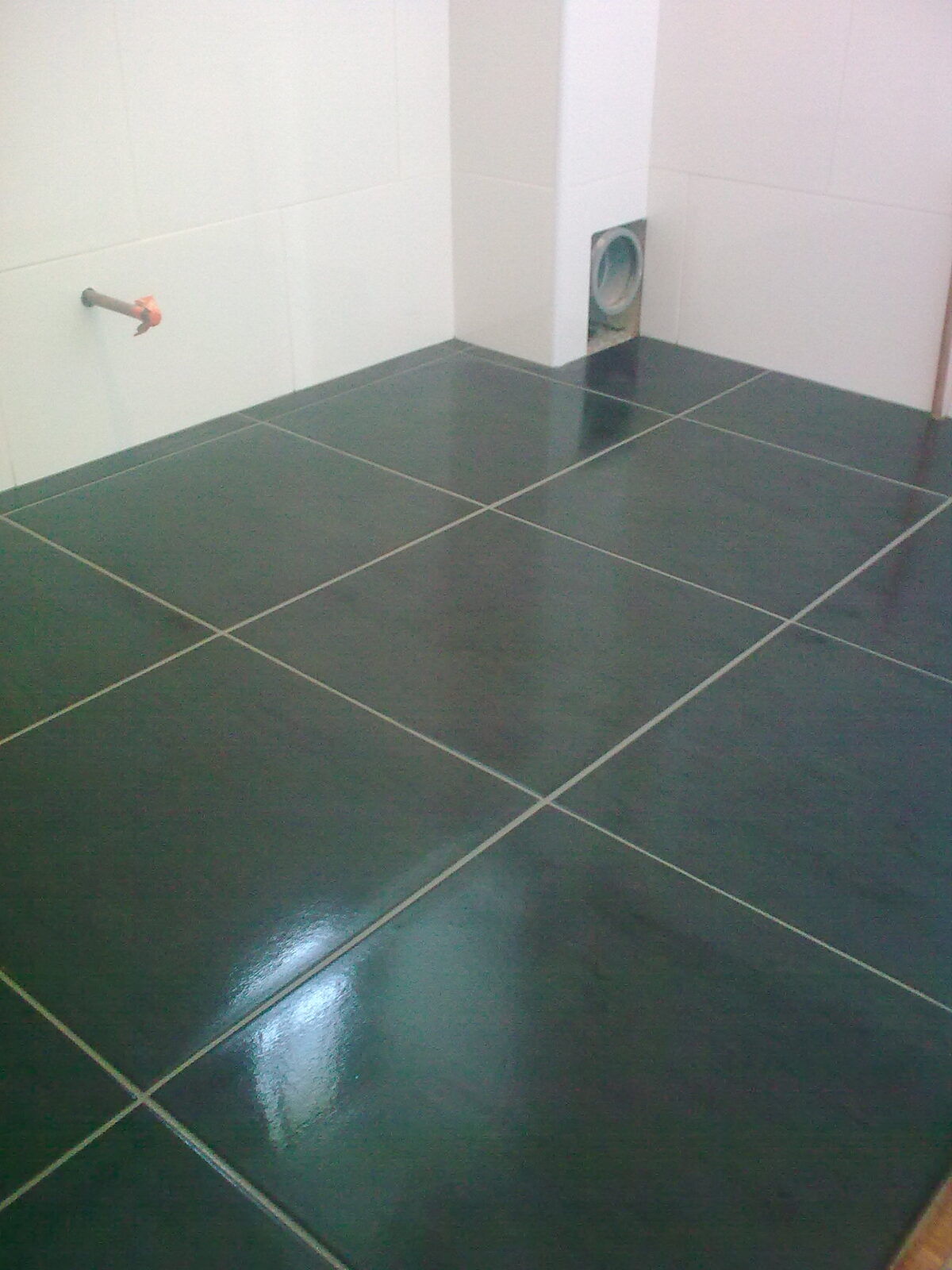 Dark gloss tiled floor