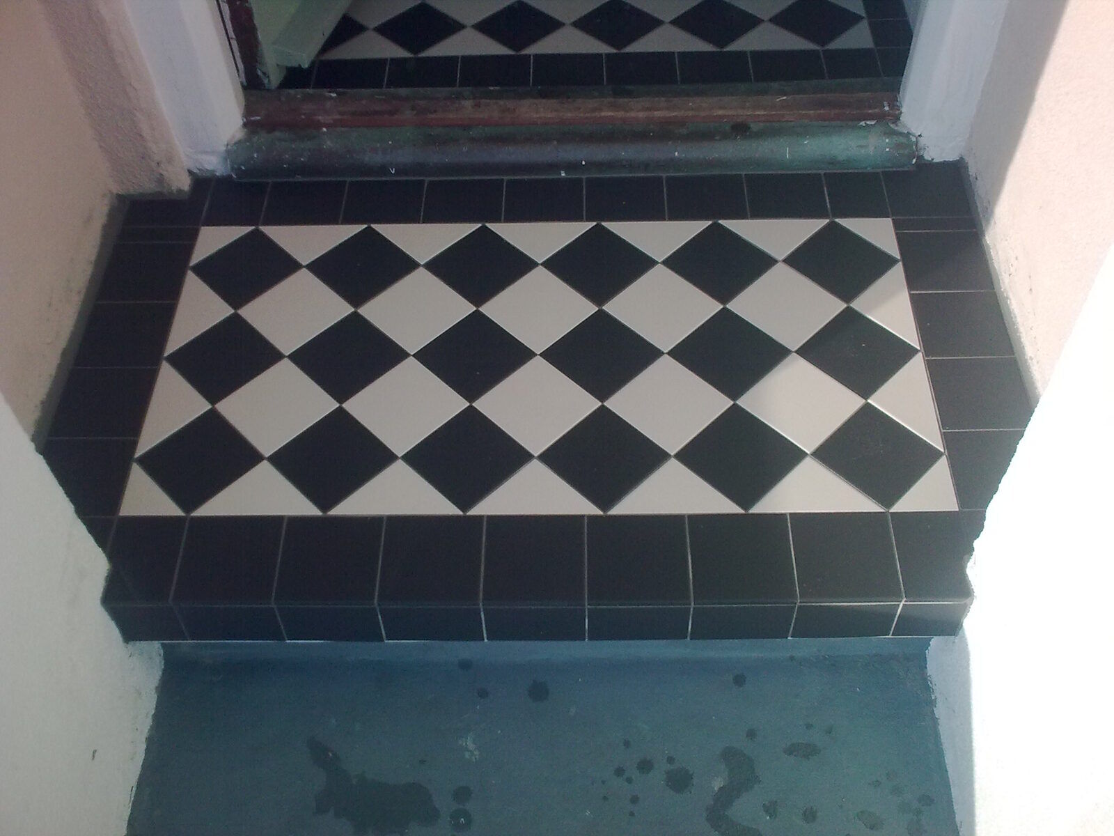 Chequerboard tiled floor