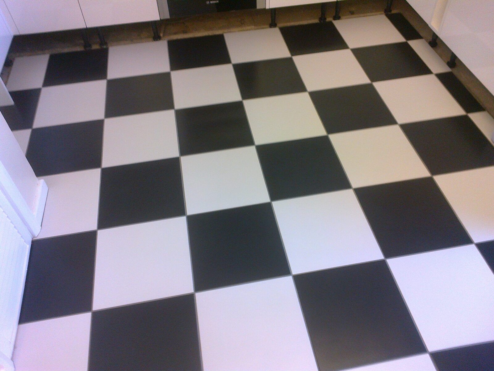 Chequerboard tiled floor