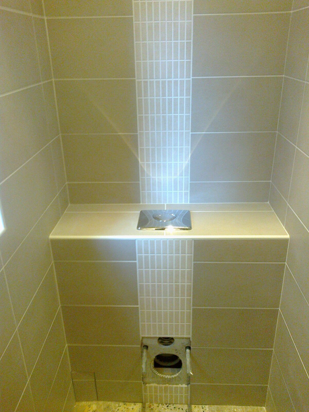 White tiled bathroom