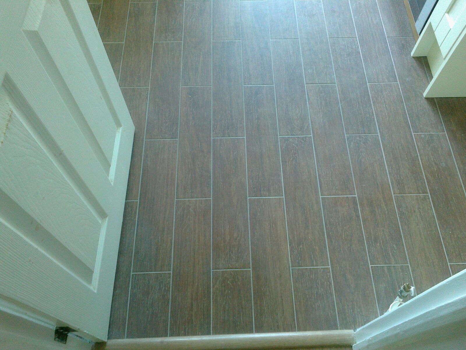 Tiled bathroom with mosaic feature